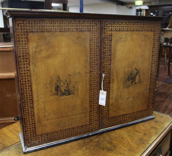 An unusual late 19th century penwork two door cupboard, 29.5in.